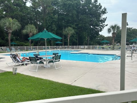 Updated relaxing outdoor pool… one of several.
