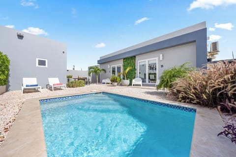 Enjoy a refreshing dip in the crystal-clear pool, perfect for cooling off.