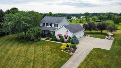 Spacious 3 Car Garage & Plenty Of Parking For Trailers Or RV.