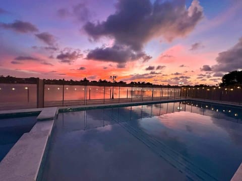 Welcome to Your Dream Family Getaway. Imagine stepping into a serene waterfront where every detail is designed with your comfort in mind. This home isn’t just a vacation spot—it’s a place to recharge, reconnect, & create unforgettable family memories