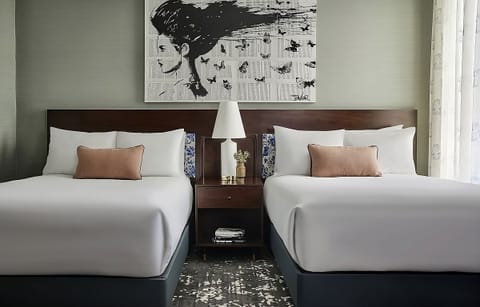 Drift off in serene comfort with balanced lighting and plush beds.