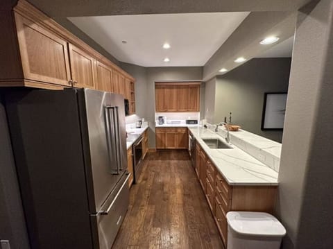 Cook with ease in our efficient kitchen, equipped with high-end appliances, ample counter space, and stylish cabinetry. Ideal for preparing delicious home-cooked meals.