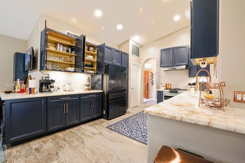 Kitchen with refrigerator, Ninja coffee center, kitchen aid mixer, toaster