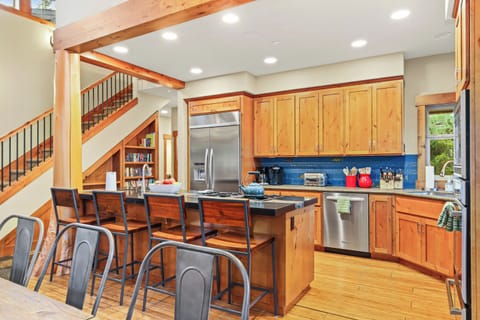 A modern kitchen equipped with all the essentials for your cooking needs