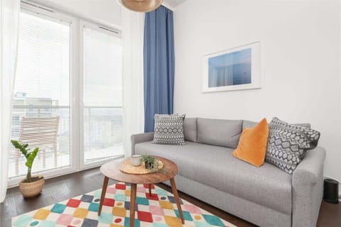 Living room with kitchenette.