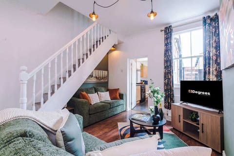The spacious living room benefits from a double sofa-bed, Smart TV with Netflix and plenty of space to sit down after a long day exploring Chester.