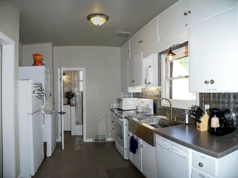 Well-lit and fully stocked kitchen