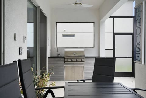 Unwind in style with a private pool, hot tub, BBQ kitchen, and ample seating—your ultimate outdoor oasis!