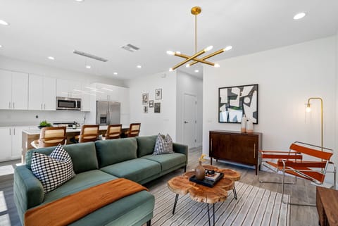 Experience the elegance of our modern living room with an open floor plan, designed for comfort and style!