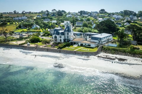 Sailing lessons and coastal walks are just outside, and this garden terrace looks straight out over the sea.
