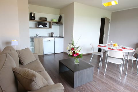 Sink into the cozy sofa after a day exploring the area.