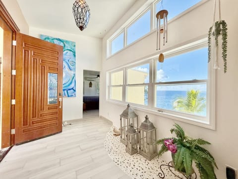 When you enter the door and head to the left, you will find the first primary suite.