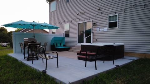 Enjoy grill, hot tub, benches, umbrella & sun bed outdoors.