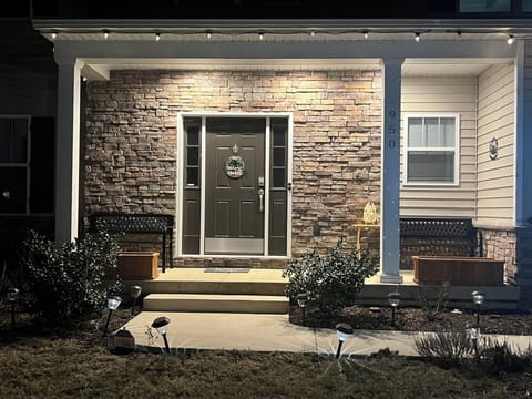 Welcoming front porch with classic bench seating