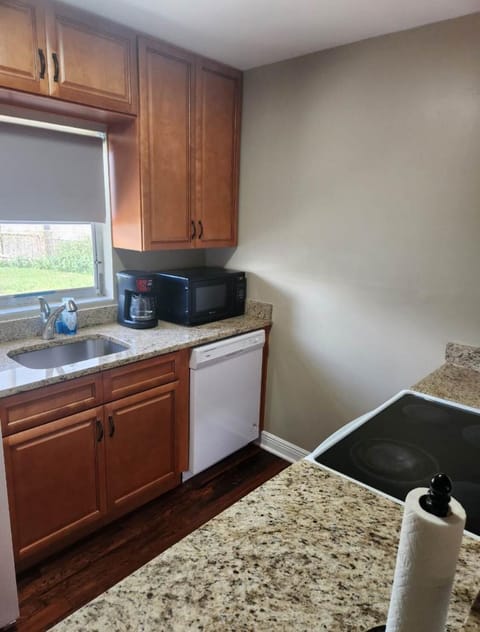 Kitchen with a microwave and a refrigerator
