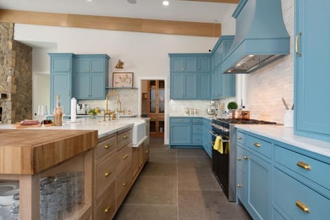 Custom kitchen with 2 dishwashers, pantry, and aga stove