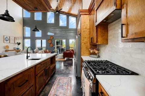 Floor-to-ceiling windows provide beautiful mountain views