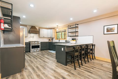 Fully-equipped kitchen with easy access to the deck.
