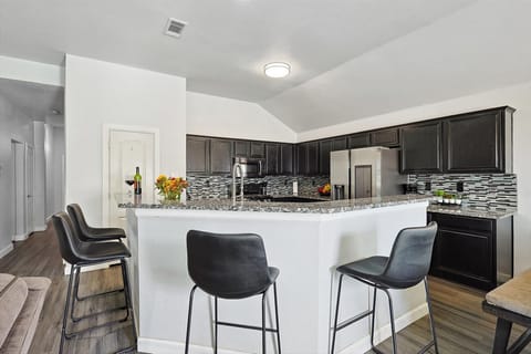 Bar area located right next to the kitchen for added comfort!