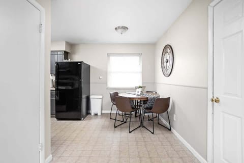 Enjoy your meal in this lovely dining table and chairs with ceiling fun and lots of natural lights.