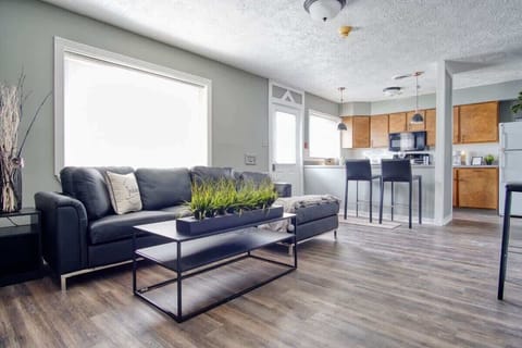 This expansive living space includes WIFI, TV, and a new sofa for kicking back and watching your favorite show or movie.