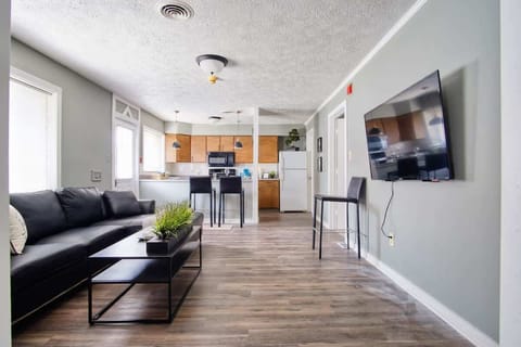 This expansive living space includes WIFI, TV, and a new sofa for kicking back and watching your favorite show or movie.