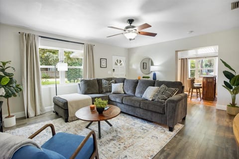 Whether you're catching up on emails in the armchair or gathering around the coffee table, you'll feel right at home in this bright, airy retreat.
