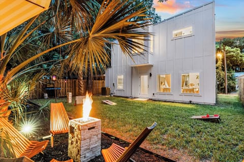 Coastal oasis inside & outside with games, fire pit, hammock, swing, grill, etc.