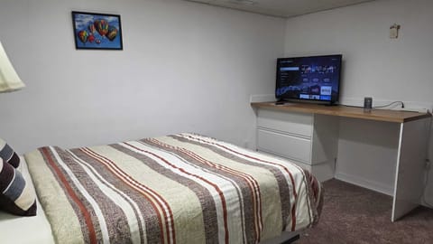 Bedroom with 43" TV