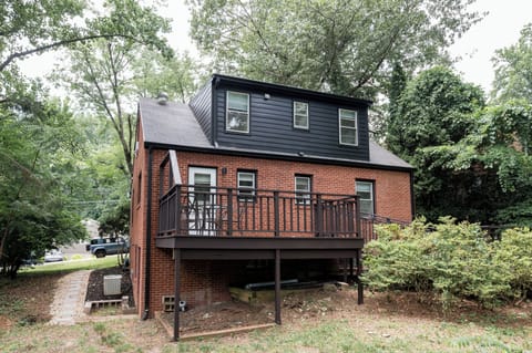 The home sits on a corner lot with a spacious backyard and outdoor dining for 4.