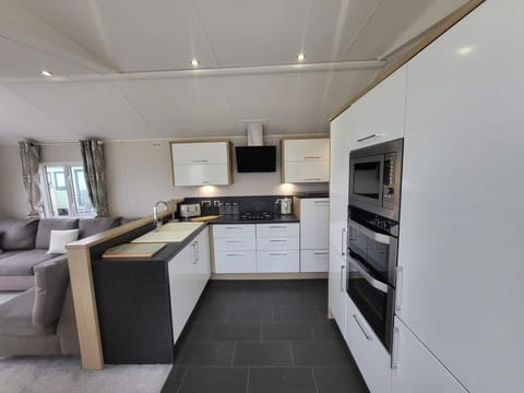 Enjoy the best of UK family holidays at Valley Farm Holiday Park Clacton on Sea United Kingdom, where the Essex beaches and a cosy kitchen area in a caravan make for an unforgettable last minute staycation.