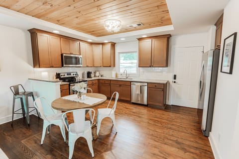 Kettle and tea assortment provided. French press, grinder, and coffee pot too.