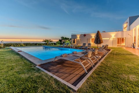 Private pool and sun terrace at dusk — Villa Atlantic Blue, holiday villa in Mafra
