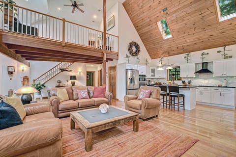 Living room with chef’s open kitchen