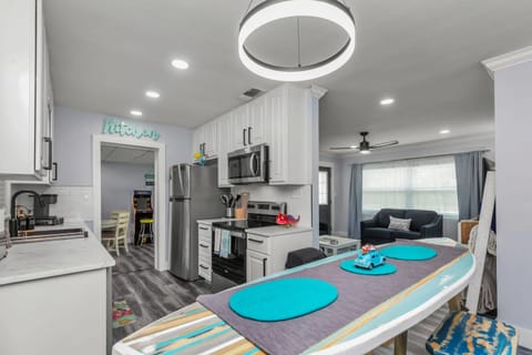 Dining Area Table View of the Kitchen and Bonus Room