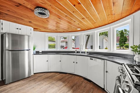 Kitchen is fully stocked with cooking and dining necessities