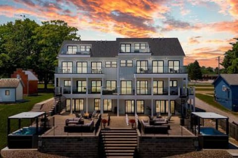 The back of the home features a spacious outdoor area designed to maximize enjoyment of the stunning