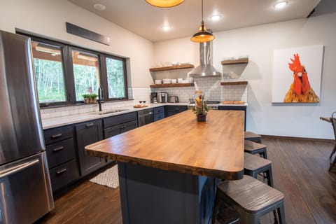 The large kitchen island is perfect for meal prep and additional seating.