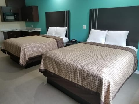 Recharge in a bright double-room designed for restful nights.