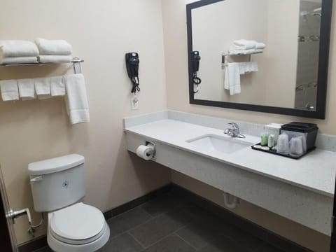 Refresh comfortably with a clean vanity and fresh towels.