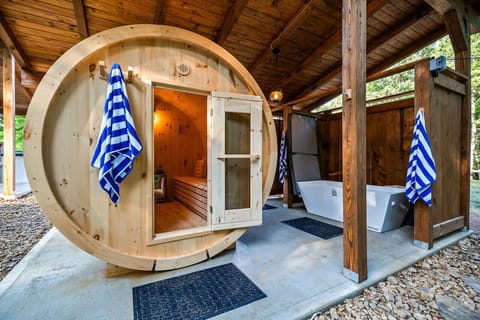 The 8-person barrel sauna is shared among all guests on the property.