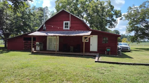 Relax on the porch with your morning coffee that overlooks the horse pasture