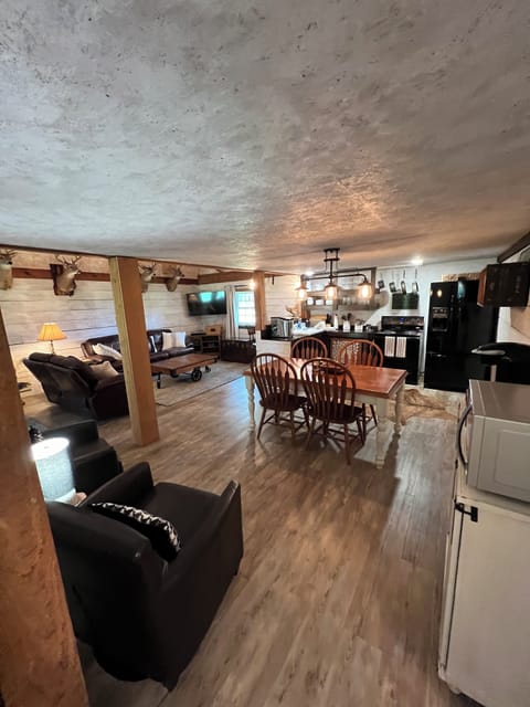 Sitting area overlooks the kitchen and living room