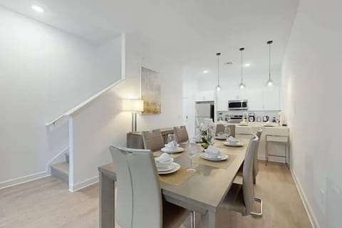 Enjoy meals together in the spacious dining area with ample seating.