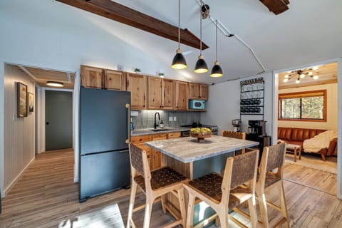 fully stocked kitchen with dishwasher, coffee bar, and all the essentials