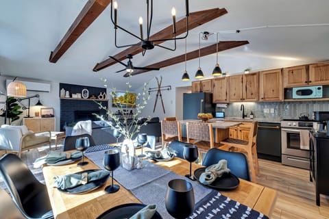 open concept dining, kitchen, and living room