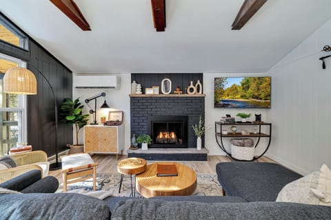 living room: gas fireplace (remote operated), 65" Smart TV, record player