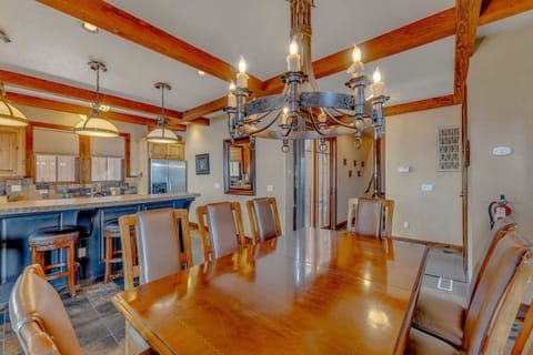 Dining Room: 7-person dining table, access to patio and backyard, connected to kitchen