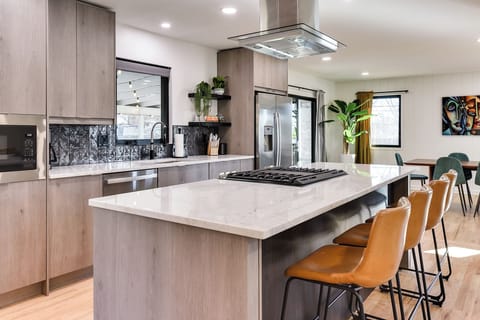 Kitchen center Island With Stove top grill.