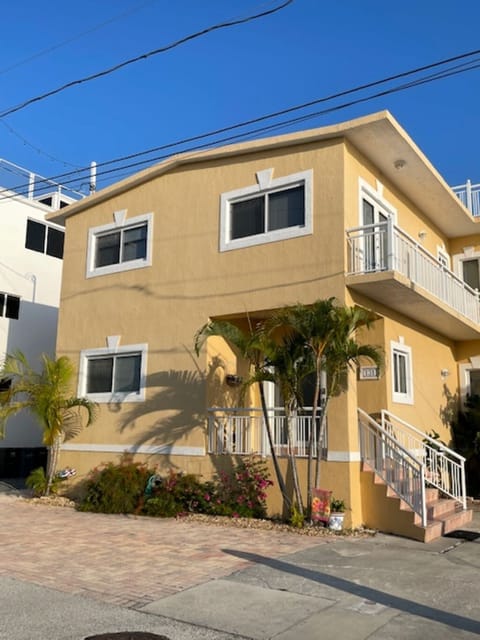 Front view with mangrove view, last street, plenty of parking too!